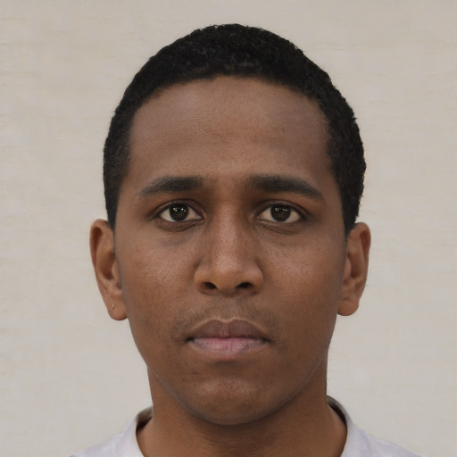 Neutral black young-adult male with short  black hair and brown eyes