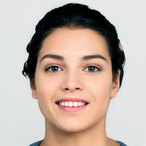 Joyful white young-adult female with short  black hair and brown eyes