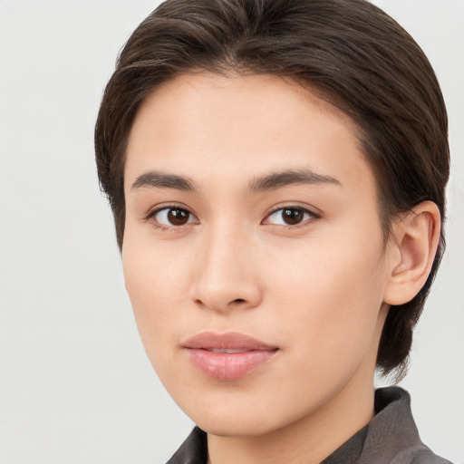 Neutral white young-adult female with medium  brown hair and brown eyes