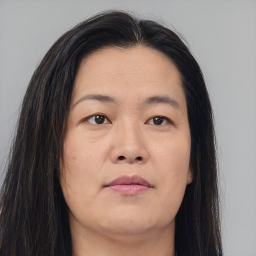Neutral asian young-adult female with long  brown hair and brown eyes