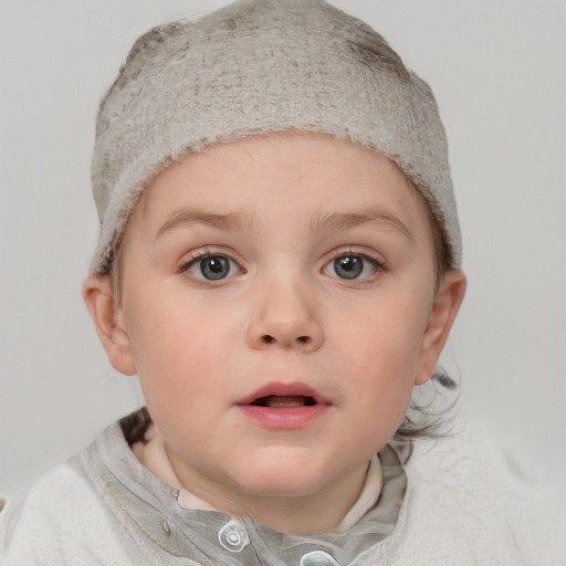 Neutral white child female with short  brown hair and blue eyes