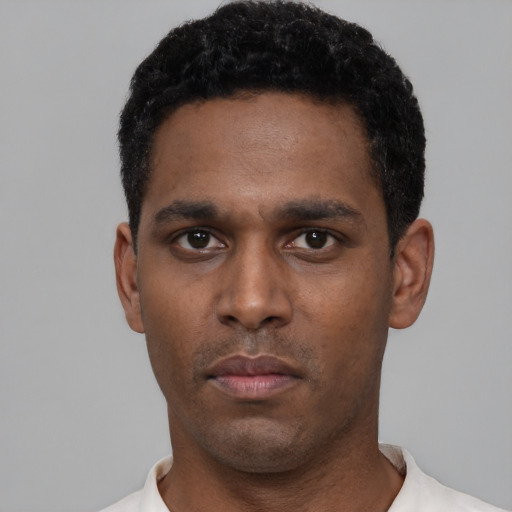Neutral black young-adult male with short  black hair and brown eyes