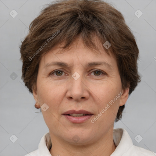 Joyful white adult female with short  brown hair and brown eyes