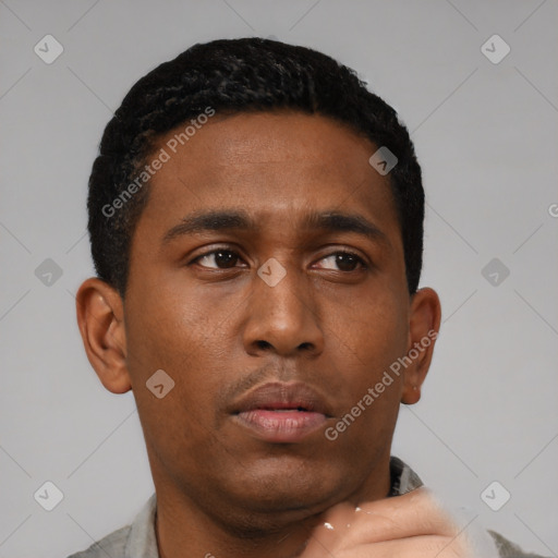 Neutral black young-adult male with short  black hair and brown eyes