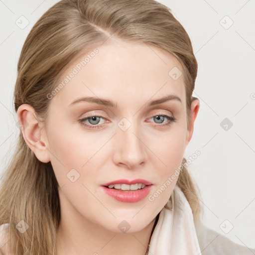 Joyful white young-adult female with long  brown hair and blue eyes