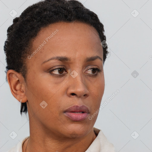 Neutral black adult female with short  brown hair and brown eyes