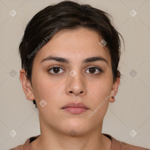 Neutral white young-adult female with medium  brown hair and brown eyes