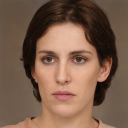 Neutral white young-adult female with medium  brown hair and brown eyes