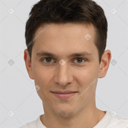 Joyful white young-adult male with short  brown hair and brown eyes