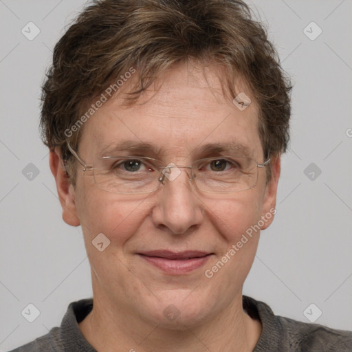 Joyful white adult male with short  brown hair and grey eyes