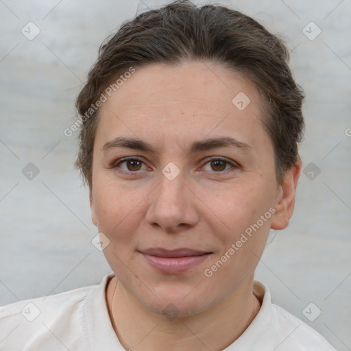 Joyful white adult female with short  brown hair and brown eyes