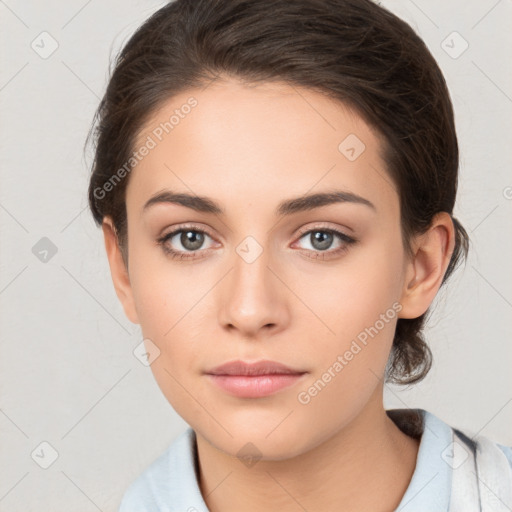 Neutral white young-adult female with medium  brown hair and brown eyes