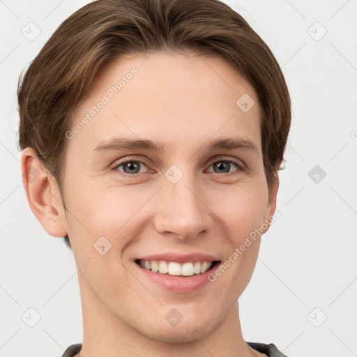 Joyful white young-adult female with short  brown hair and grey eyes