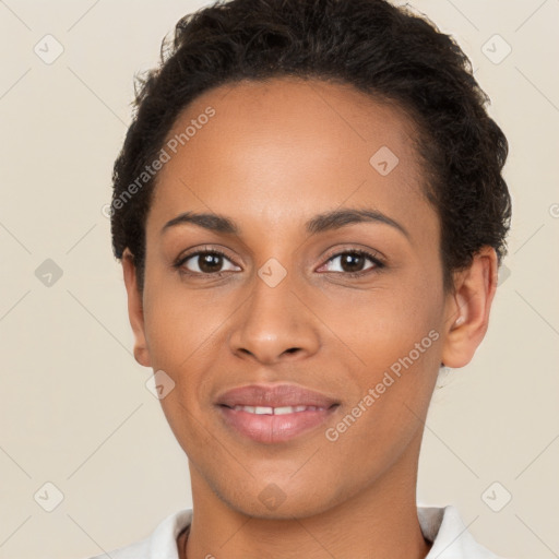 Joyful latino young-adult female with short  brown hair and brown eyes