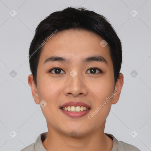 Joyful asian young-adult male with short  black hair and brown eyes