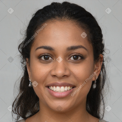 Joyful latino young-adult female with long  brown hair and brown eyes