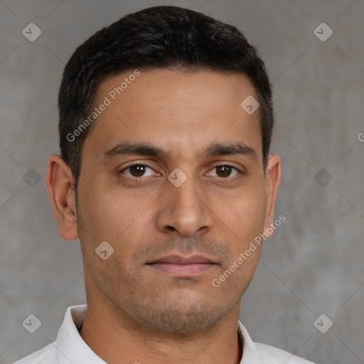 Neutral white young-adult male with short  brown hair and brown eyes
