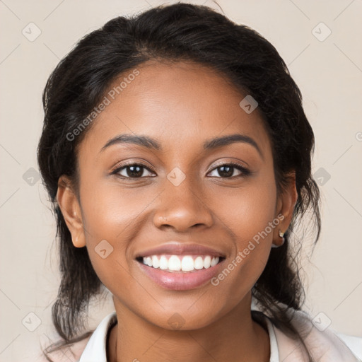 Joyful latino young-adult female with medium  brown hair and brown eyes