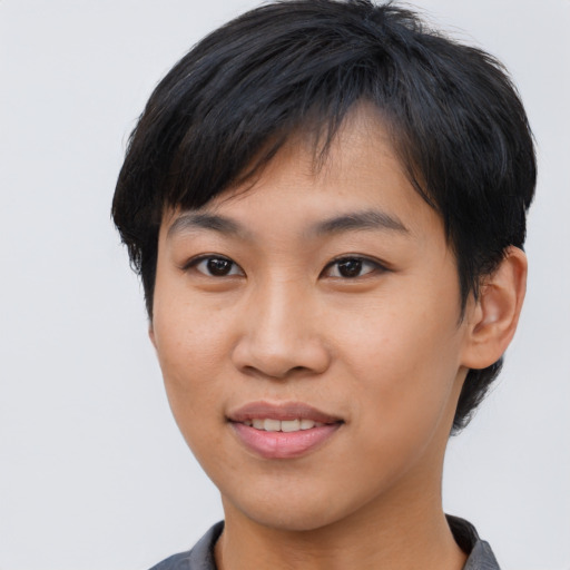 Joyful asian young-adult female with short  black hair and brown eyes