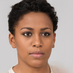 Neutral black young-adult female with short  brown hair and brown eyes