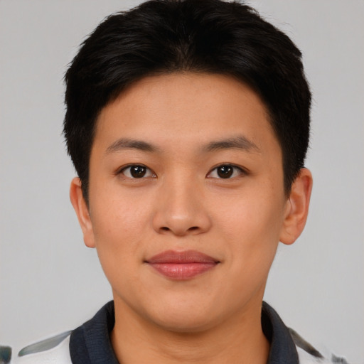 Joyful asian young-adult female with short  black hair and brown eyes