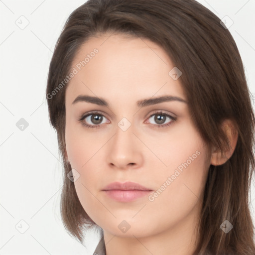 Neutral white young-adult female with long  brown hair and brown eyes