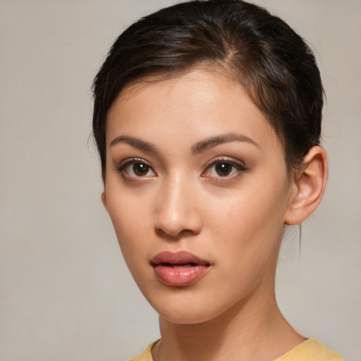 Neutral white young-adult female with short  brown hair and brown eyes