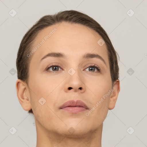 Neutral white young-adult female with short  brown hair and brown eyes