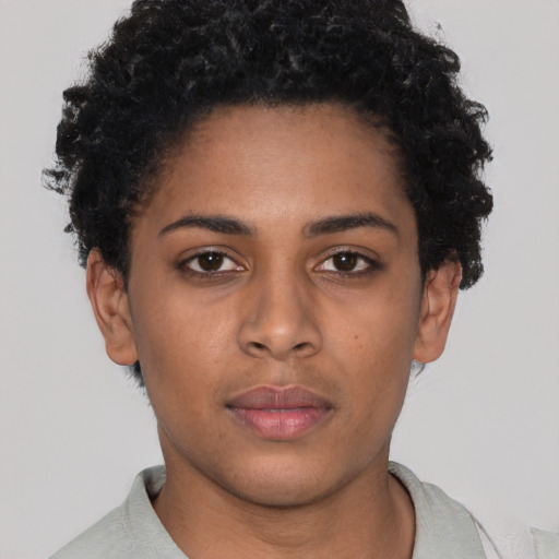 Neutral black young-adult female with short  black hair and brown eyes