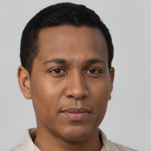 Neutral black young-adult male with short  brown hair and brown eyes