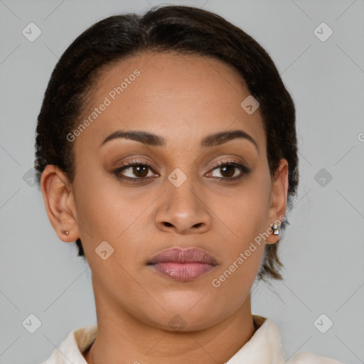 Joyful latino young-adult female with short  brown hair and brown eyes