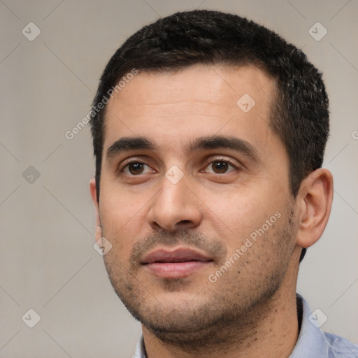 Neutral white young-adult male with short  black hair and brown eyes