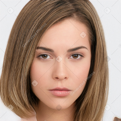 Neutral white young-adult female with long  brown hair and brown eyes