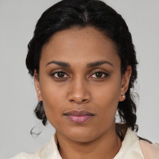 Neutral latino young-adult female with short  black hair and brown eyes