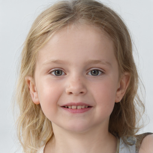 Joyful white child female with medium  brown hair and blue eyes