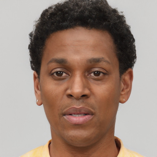 Neutral black young-adult male with short  brown hair and brown eyes