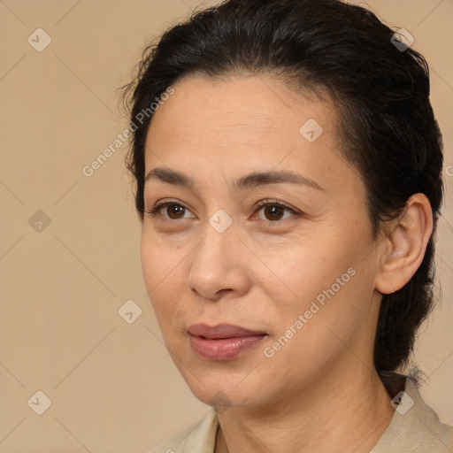 Joyful white adult female with medium  brown hair and brown eyes