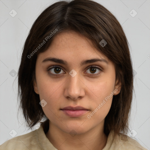 Neutral white young-adult female with medium  brown hair and brown eyes