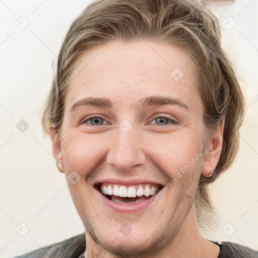 Joyful white young-adult female with short  brown hair and grey eyes