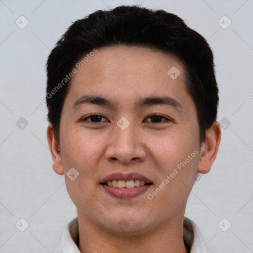 Joyful asian young-adult male with short  black hair and brown eyes