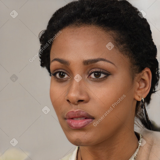 Neutral black young-adult female with short  black hair and brown eyes