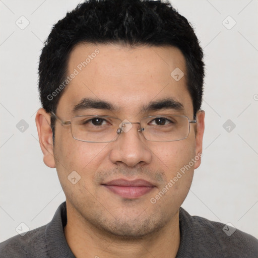 Joyful white adult male with short  black hair and brown eyes