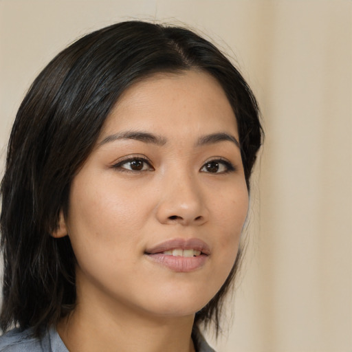 Neutral asian young-adult female with medium  brown hair and brown eyes