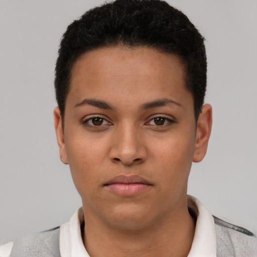 Neutral latino young-adult female with short  black hair and brown eyes
