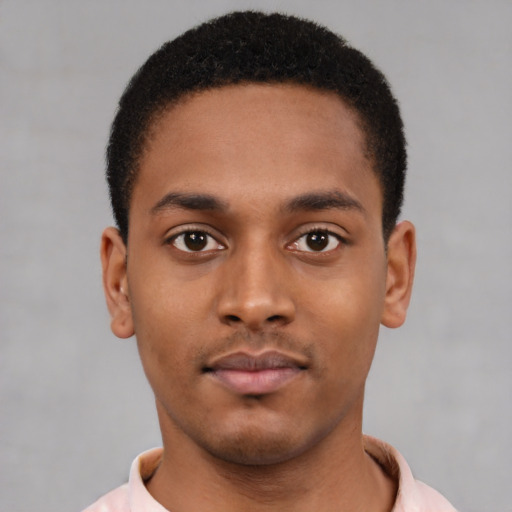 Neutral latino young-adult male with short  brown hair and brown eyes
