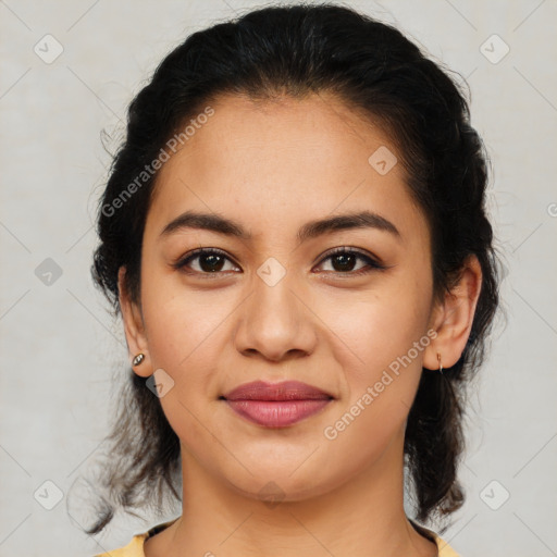 Joyful latino young-adult female with medium  brown hair and brown eyes