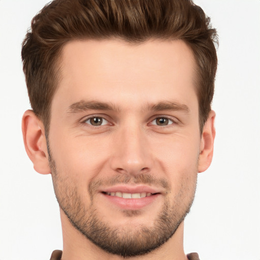 Joyful white young-adult male with short  brown hair and brown eyes