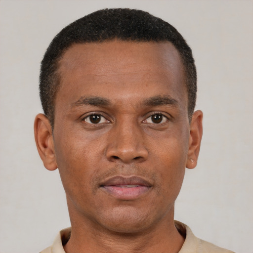 Neutral black adult male with short  brown hair and brown eyes
