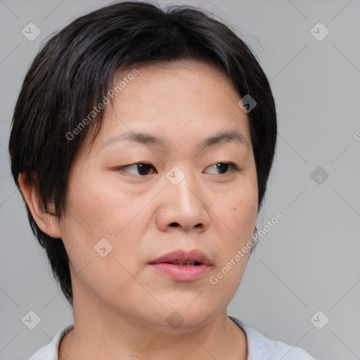 Neutral asian young-adult female with medium  brown hair and brown eyes