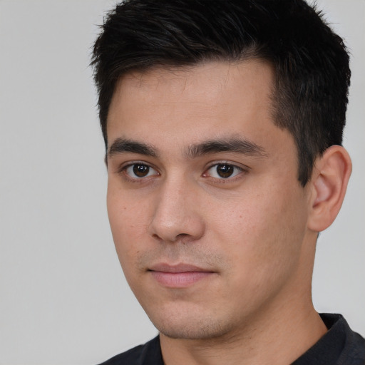 Neutral white young-adult male with short  black hair and brown eyes